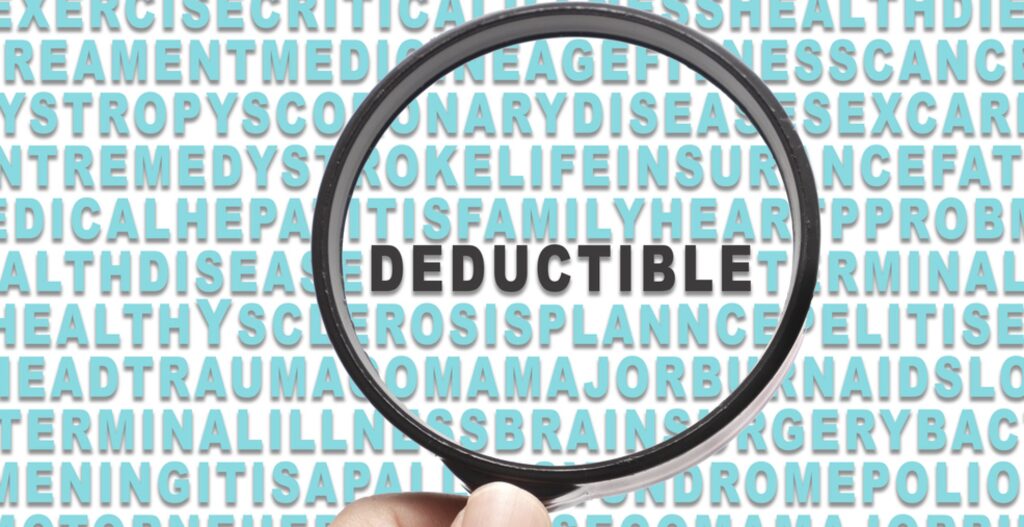 Magnifying glass highlights the word deductible